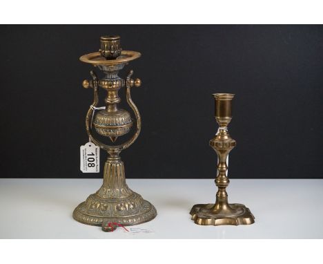 A Victorian brass maritime ship's "gimbal" candlestick, h: 26cm, together with another brass candlestick (2) 