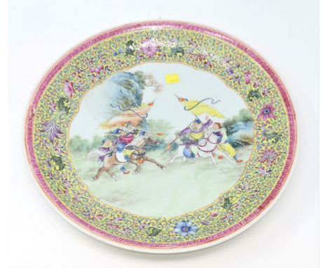 A Chinese famille jaune wall plaque depicting central scene of warriors on horse back 34cm diameterflaw to enamel border on l