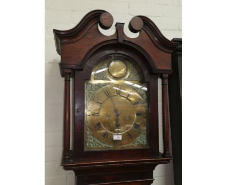 An 18th century crossbanded oak longcase clock, the hood with swan neck pediment and turned side columns, arched full length 