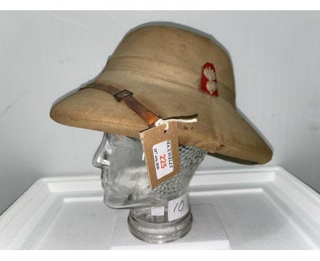 Lancashire Fusiliers, a tropical pith helmet, possibly 1930's, red cloth badge and stand 