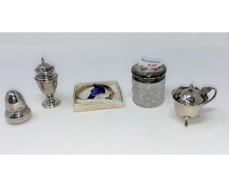 2 silver pepper pots; a silver mustard; silver top hair tidy and a silver bangle 