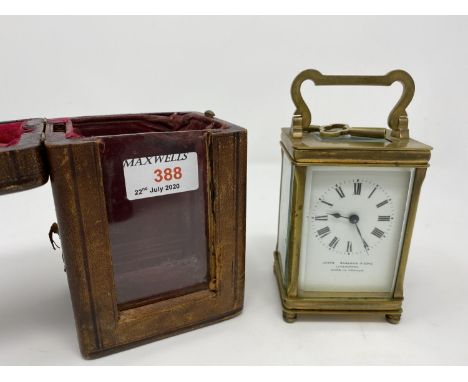 A 19th century brass carriage clock with timepiece movement in original red leather outer case; 3 small framed prints 