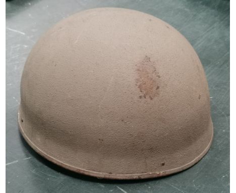 A WWII style British paratroupers helmet 