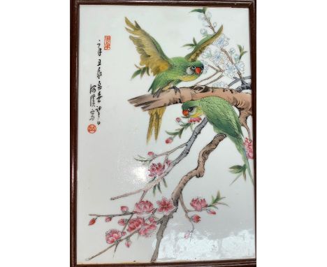 A Chinese ceramic plaque depicting parrots, in wooden frame and a similar lidded pot and bowl Plaque good condition, 2 pots O