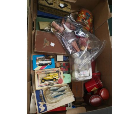 A selection of vintage toys and games:  2 sets of dominoes; darts; marbles; piggy banks; miniature dolls; etc. 