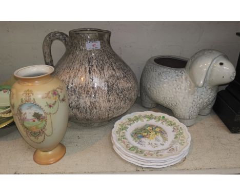 A large pottery wine jug/pitcher, a vase, other decorative items 