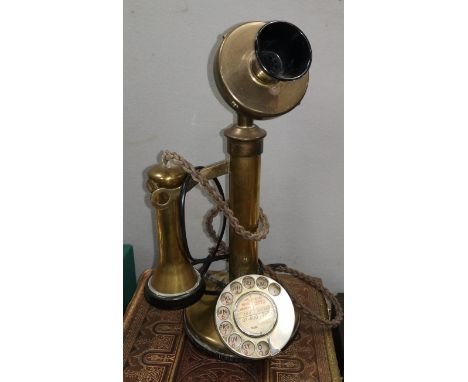 An early 20th century stick telephone in brass 