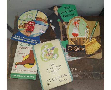 A selection of vintage cardboard advertising signs Clarks shoes and others 