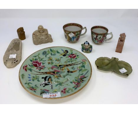 A 19th century Chinese famille verte plate with celadon ground; 2 similar cups; a small jade coloured leaf dish; Chinese seal