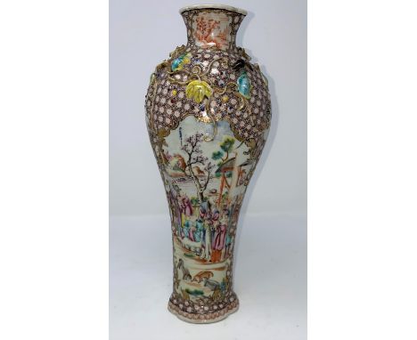 A Chinese porcelain vase with enamel decoration of traditional scenes, relief of leaves and vines to the shoulderMinor loss t