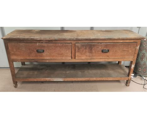 A vintage pine work bench with 2 drawers and shelf below, length 180cm 