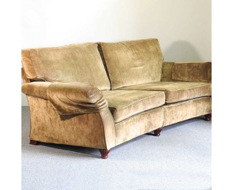 A large Multiyork green upholstered sofa, on turned legs, together with a matching armchair (2)250w x 125d x 100h cmOverall c