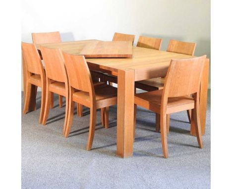 A light oak dining suite, attributed to Heal's, comprising an extending dining table with an additional leaf, 241 x 100cm ove