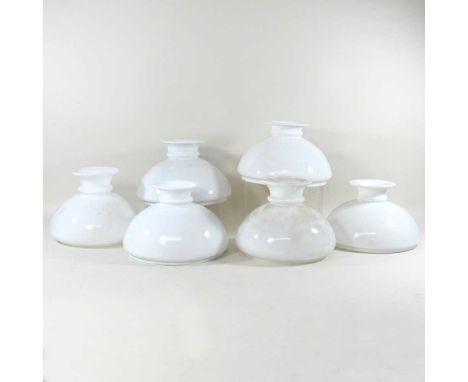 A near set of six opaque white glass oil lamp shades, each with a nine inch aperture (6)
