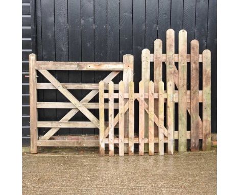 A wooden five bar garden gate, 122cm wide, together with two others (3)