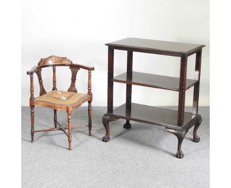 An Edwardian inlaid corner chair, with tapestry seat, together with an early 20th century three tier buffet, on claw and ball