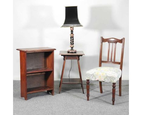 An Indian kashmiri style table lamp and shade, 76cm high, together with an Edwardian occasional table, chair and open bookcas