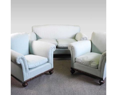 A 1920's oak and turquoise upholstered sofa, 156cm wide, together with a pair of matching armchairs (3)Overall solid and usab