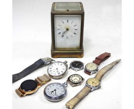A brass cased carriage clock, together with various wristwatches and pocket watches
