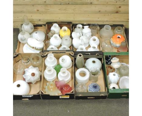 Eight boxes of assorted glass oil lamp shades, various colours and designs