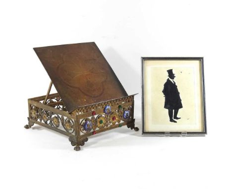 A 19th century continental gilt metal book stand, with a ratchet top, dated 1883, 27cm wide, together with a 19th century sil