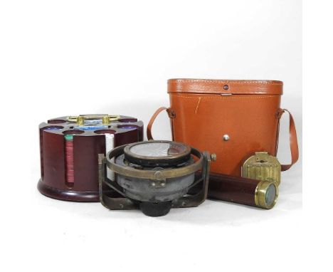 A World War II Type PIL binnacle compass, No.37461, 13cm diameter, together with a brass compass, a telescope and poker game