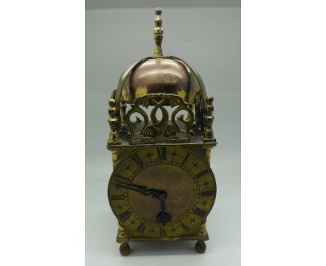 A Smiths brass lantern clock