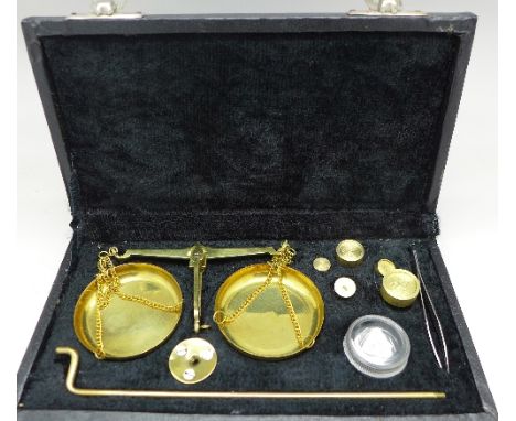 A cased set of balance scales