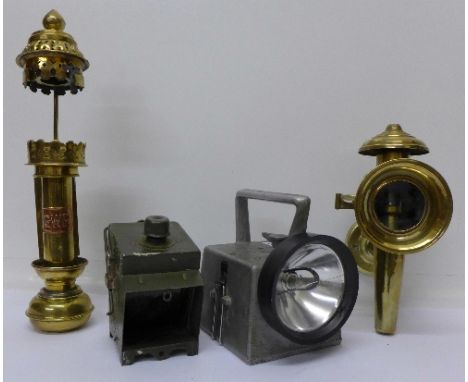 A G.W.R. lamp, a B.R. lamp and two other lamps