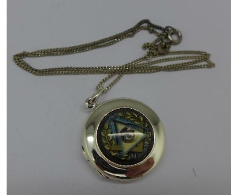 A silver Masonic locket and chain