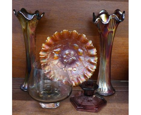 A pair of carnival glass vases, a carnival glass bowl, an etched glass bowl and candlestick