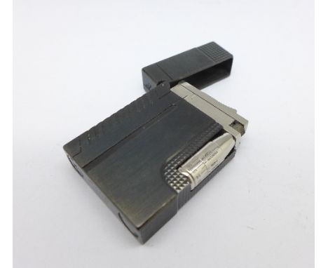 A Dupont 007 lighter, numbered 0908/5007, with time zones, no box or papers