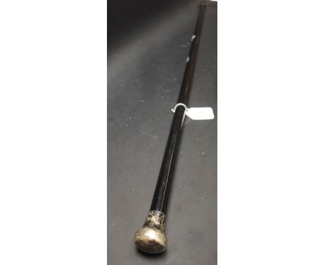 A silver topped walking cane, hallmarked