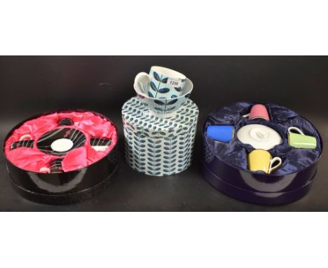 A set of four Royal Worcester demi-tasse coffee cups and saucers, designed by Lawrence Llewelyn-Bowen, cased; another set of 