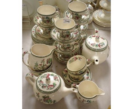 A Johnson Bros. Ironstone Indian Tree pattern tea service for ten comprising large teapot, medium teapot, cream jug, sugar bo