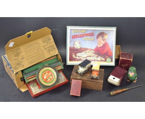 Toys - a Simplex typewriter, boxed; playing cards; cribbage board; etc.