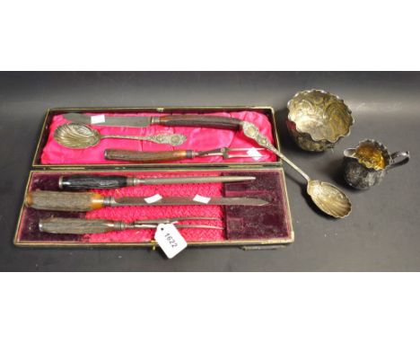 A Victorian antler hafted three-piece carving set, Walker & Hall blades, silver ferrules, cased; another similar, two-piece; 