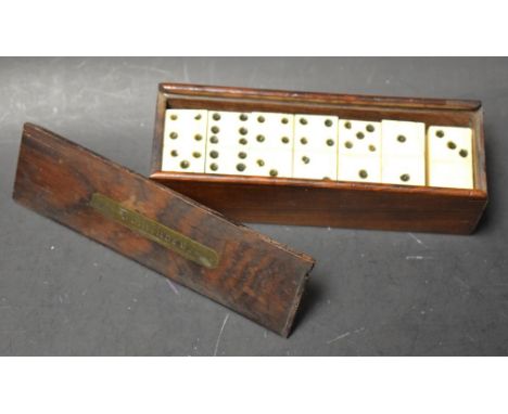 A box of early 19th century 'prisoner of war' bone dominoes