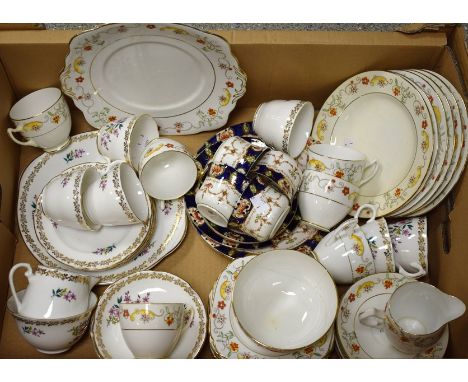 Tea Ware - a Royal Grafton six-setting tea service, printed with colourful flowers, gilt garlands, comprising milk jug, sugar