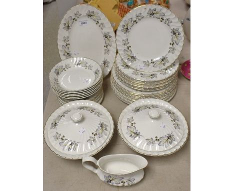 A Staffordshire bramble pattern dinner service comprising dinner plates, salad plates, tea plates. bowls, tureens, oval meat 
