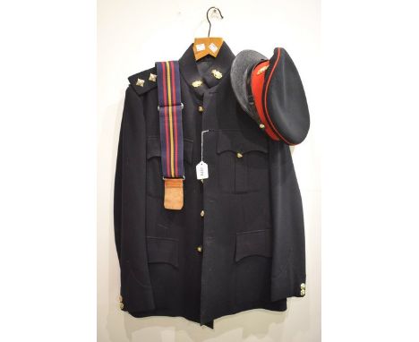 A mid-20th century Royal Army Ordnance Corps officer's tunic, trousers and cap, badges, buttons en suite, c.1960