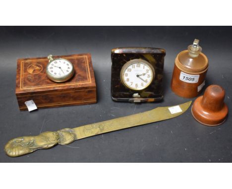 A cigarette box; a silver mounted tortoiseshell travelling clock, Finnigans, c.1900; a 19th century boxwood bottle case, c.18