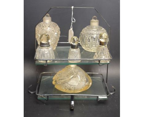 An Art Deco two tier glass and metal cake stand; a silver collared scent bottle; others (7)