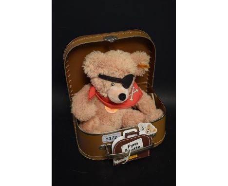 Bears - A Steiff pirate beige Teddy bear with suitcase accessories 