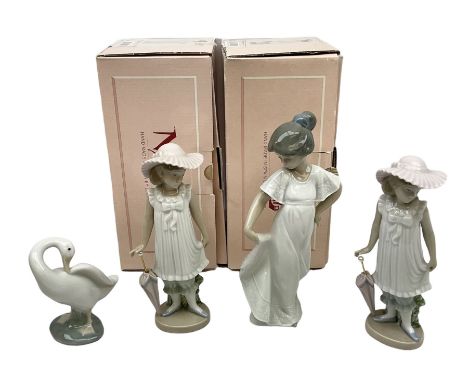 Quantity of figures to include Lladro example modelled as swan together with three Nao figures to include two April Showers n