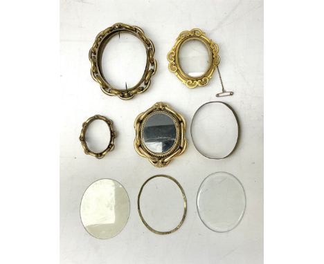 Group of early 20th century ornate gold plated (tested) and gilt brooch frames and panel fronts
