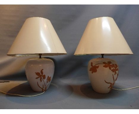 A pair of contemporary ceramic table lamps