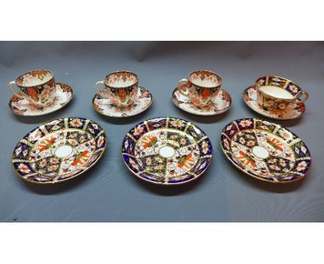 A collection of Crown Derby Imari porcelain, including three small cups and four saucers, 1877-90, and three saucers and a te