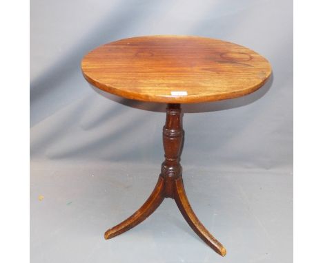 A 19th Century oak wine table, raised on tripod base. H-76cm 