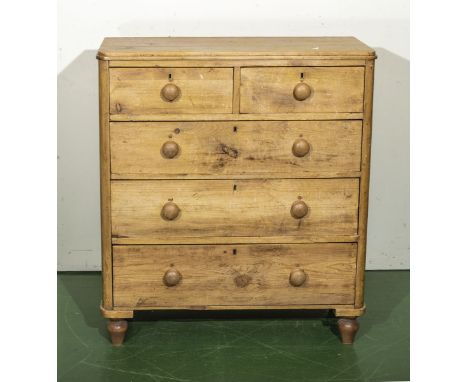 A stripped vintage pine chest of two over three drawers 